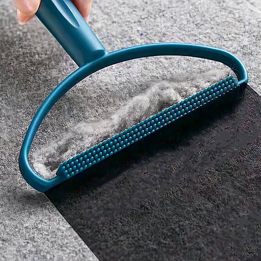 Brosse anti poils et peluches pour vêtements