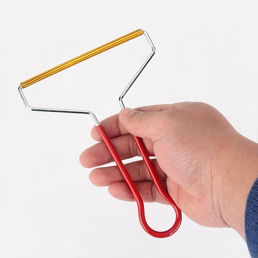 Brosse à vêtements manche acier